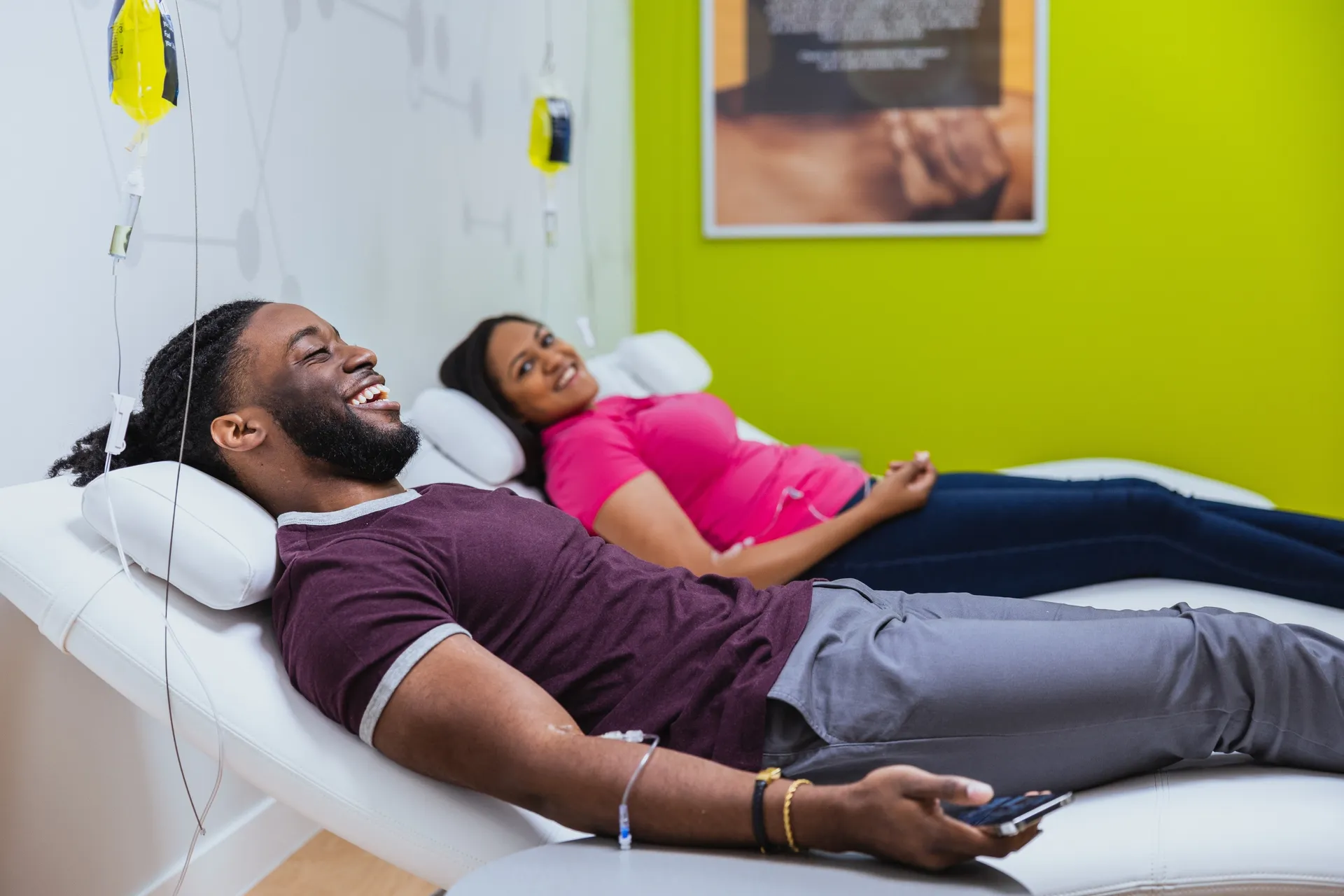 A client reclining with a drip